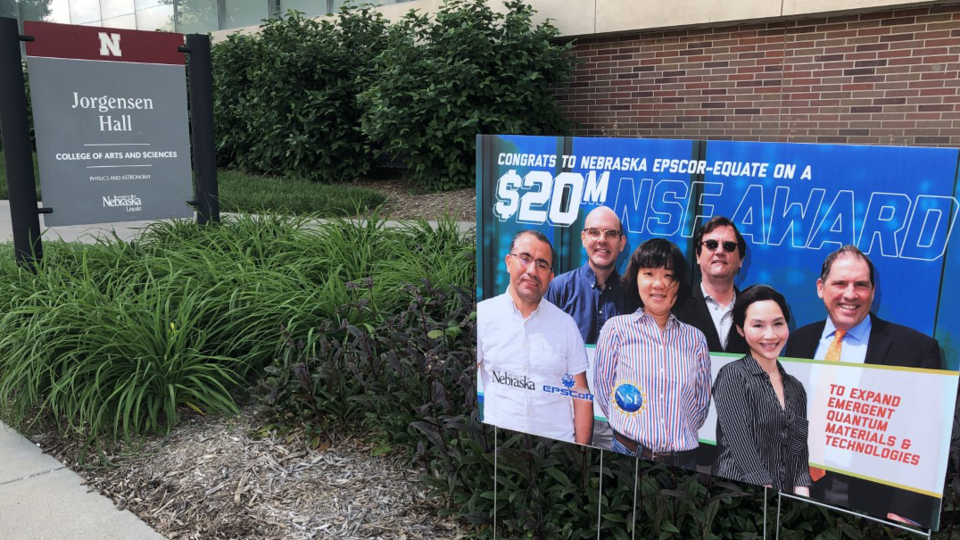 Picture of a banner placed outside Jorgensen Hall announcing the $20 million award that made the EQUATE grant possible.